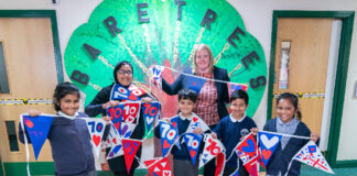 A ‘ROYAL Mile’ of bunting has been designed by primary schools in Oldham to mark the Queen’s Platinum Jubilee