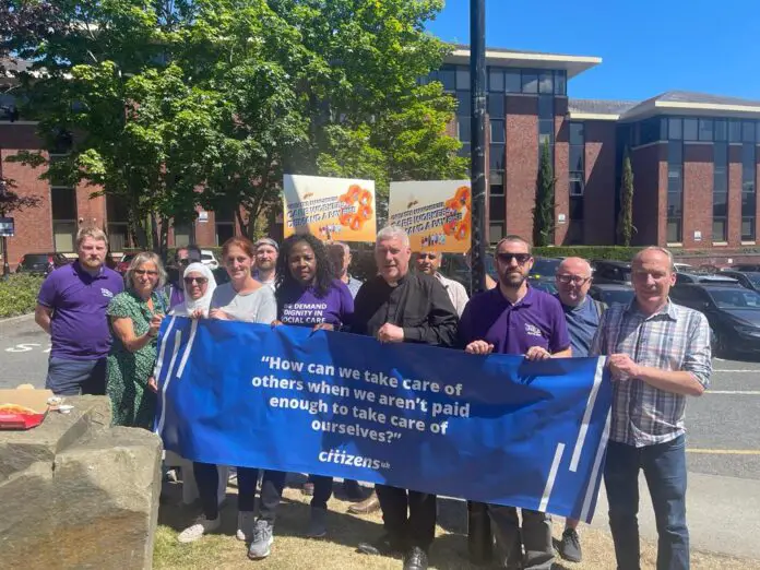 Citizens UK community leaders, including care workers and care recipients gathered outside Four Seasons Health Care headquarters in Cheshire