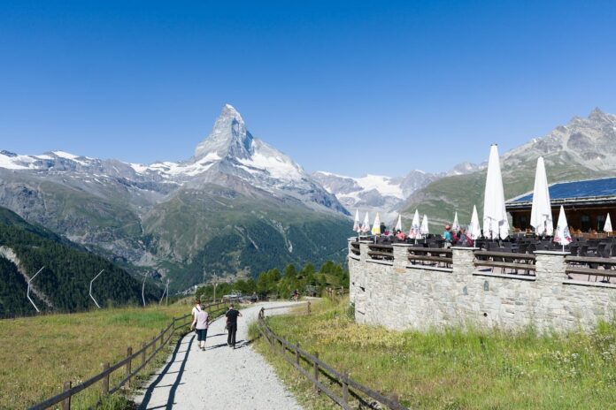 pexels-jean-paul-wettstein-677916508-32496438 scenic view of the Swiss Alps from a mountain cafe in Zermatt, Switzerland