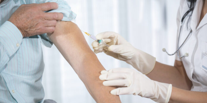 Man_having_flu_vaccination